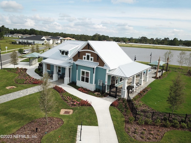 4397 Sun Garden Dr, Jacksonville, FL 32257 - view of front of home with a water view, metal roof, and a standing seam roof
