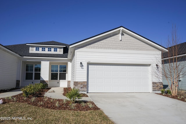 view of front of property featuring a garage