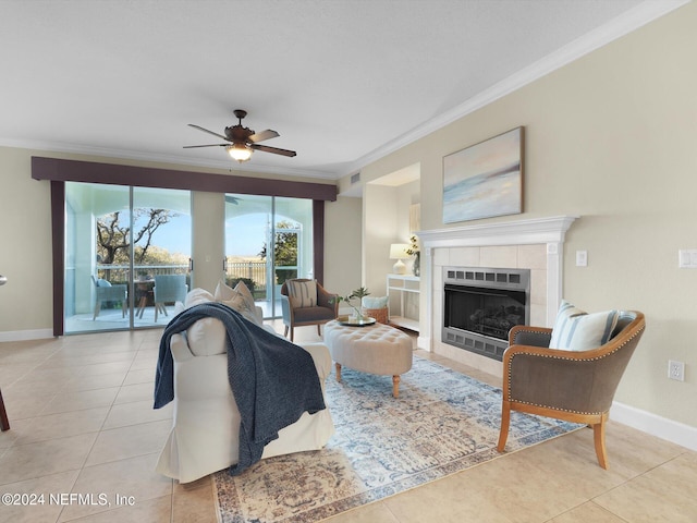 415 N Ocean Grande Dr Unit 102, Ponte Vedra Beach, FL 32082 - tiled living room with ornamental molding, a fireplace, and ceiling fan