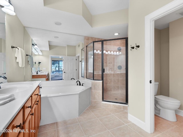 415 N Ocean Grande Dr Unit 102, Ponte Vedra Beach, FL 32082 - full bathroom with vanity, toilet, tile patterned floors, and plus walk in shower