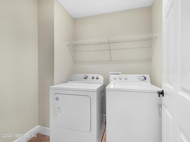 415 N Ocean Grande Dr Unit 102, Ponte Vedra Beach, FL 32082 - washroom featuring washer and dryer and tile patterned flooring