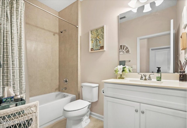 full bathroom with vanity, toilet, and tiled shower / bath