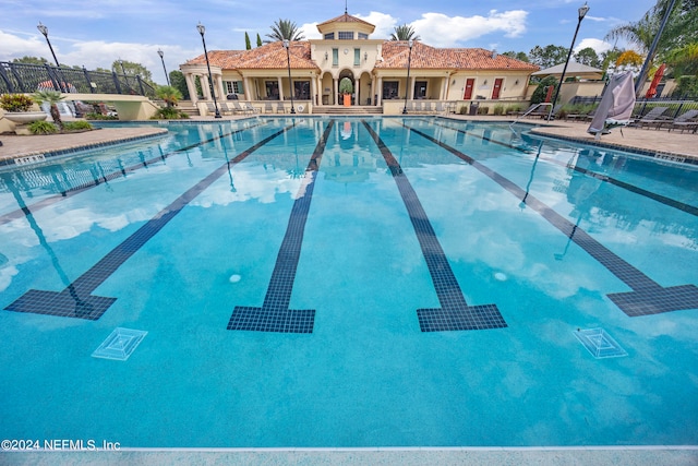 view of swimming pool with a patio