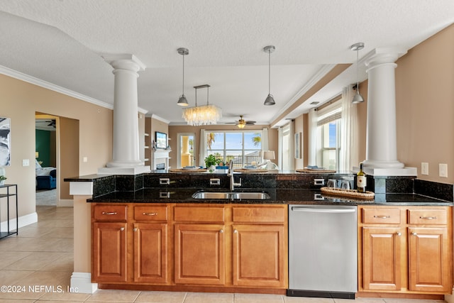 kitchen with a textured ceiling, sink, dark stone counters, and dishwasher