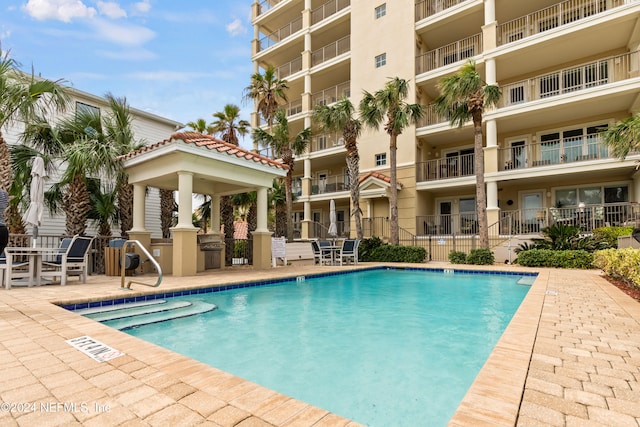 view of pool with a patio area