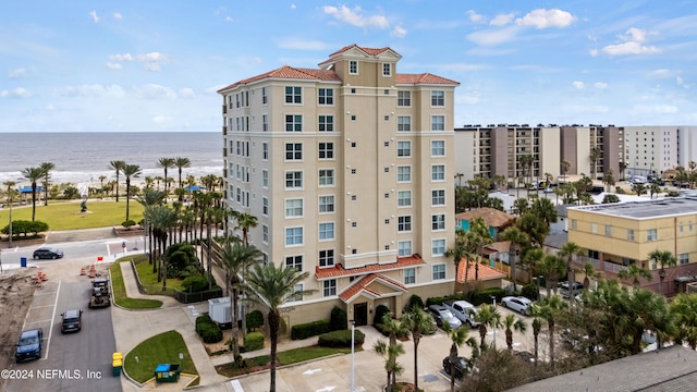 view of building exterior featuring a water view