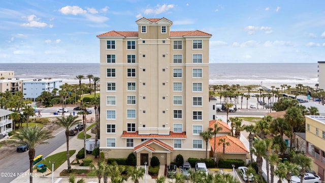 view of building exterior with a water view