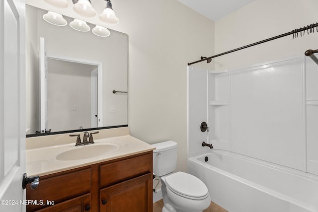 full bathroom featuring toilet, bathtub / shower combination, and vanity