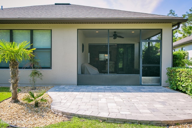 272 Hammocks Landing Dr, Ponte Vedra, FL 32081 - back of house featuring a patio, stucco siding, a ceiling fan, a sunroom, and a shingled roof