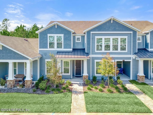 view of front of home with a front lawn