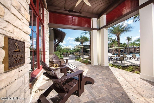 view of patio / terrace featuring ceiling fan