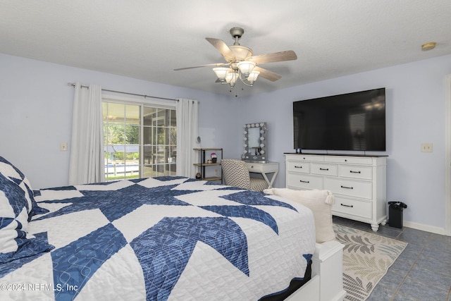 tiled bedroom with access to outside, a textured ceiling, and ceiling fan