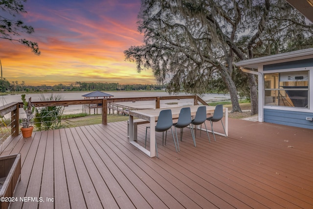 deck at dusk with a water view