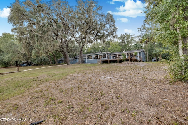 exterior space featuring a front lawn