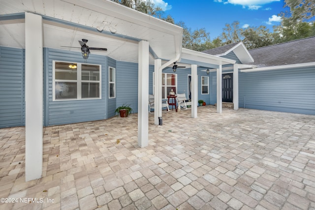 view of patio with ceiling fan