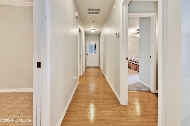 hallway featuring light hardwood / wood-style floors