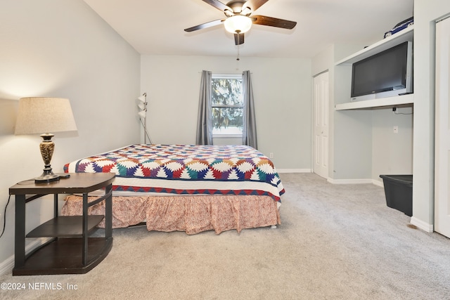 bedroom with carpet flooring, a closet, and ceiling fan