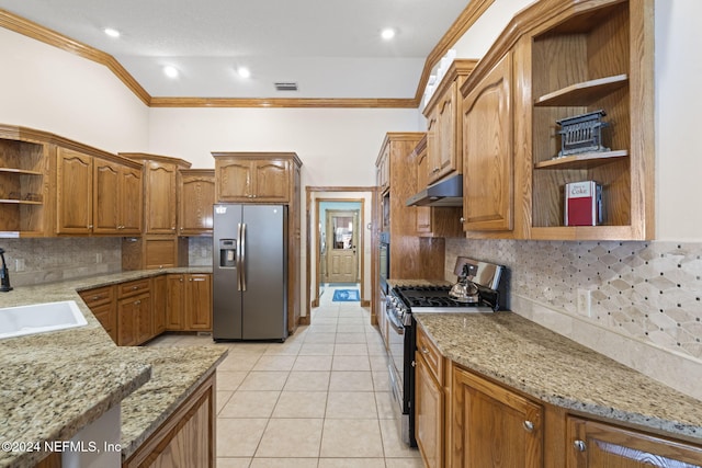 kitchen featuring sink, light stone countertops, ornamental molding, light tile patterned flooring, and stainless steel appliances