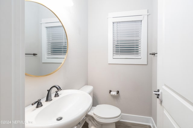 bathroom featuring sink and toilet