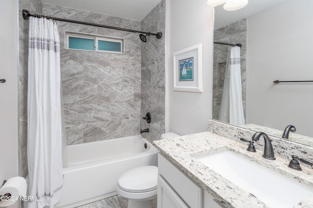 full bathroom with vanity, toilet, and shower / bath combo with shower curtain