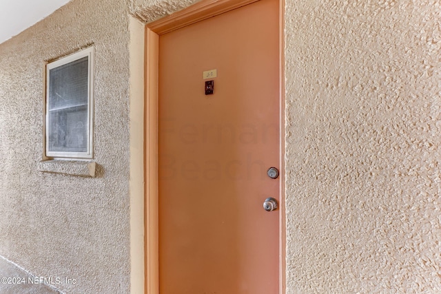 3350 S Fletcher Ave Unit J1, Fernandina Beach, FL 32034 - property entrance featuring stucco siding