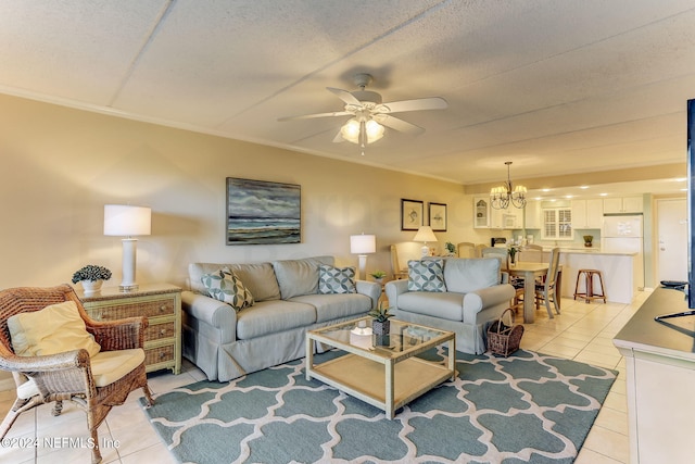 3350 S Fletcher Ave Unit J1, Fernandina Beach, FL 32034 - living room with ornamental molding, a textured ceiling, ceiling fan with notable chandelier, and light tile patterned floors