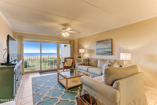 3350 S Fletcher Ave Unit J1, Fernandina Beach, FL 32034 - living room featuring a ceiling fan, ornamental molding, light tile patterned flooring, and baseboards