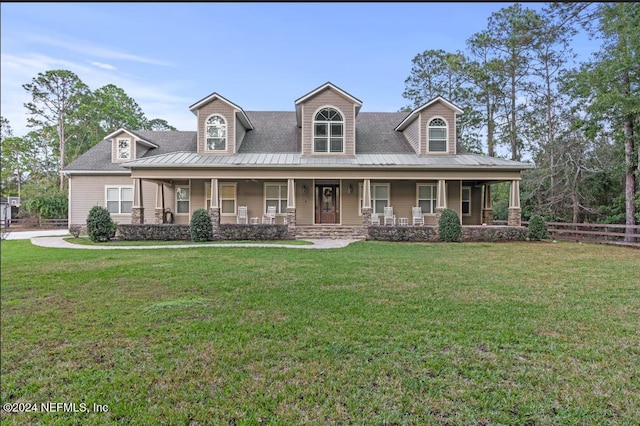 view of front facade with a porch and a front lawn