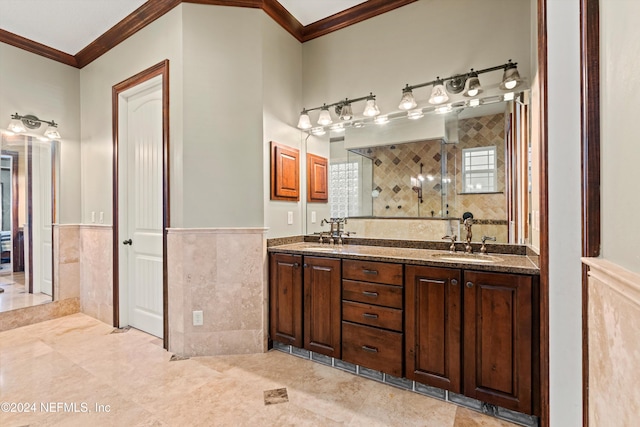 bathroom featuring crown molding, vanity, tile walls, and walk in shower