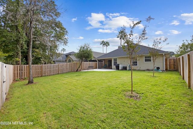 view of yard with a patio area