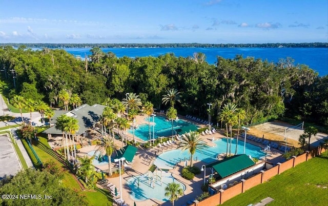 birds eye view of property with a water view