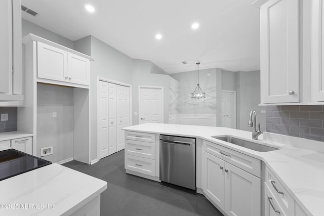 kitchen with sink, white cabinets, and dishwasher