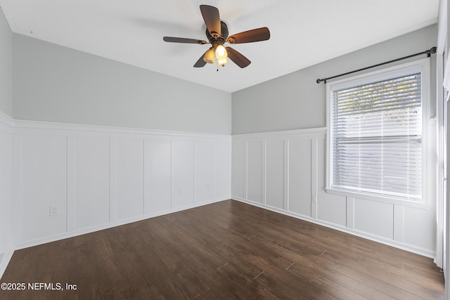 unfurnished room featuring ceiling fan and hardwood / wood-style floors