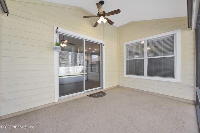 exterior space featuring ceiling fan