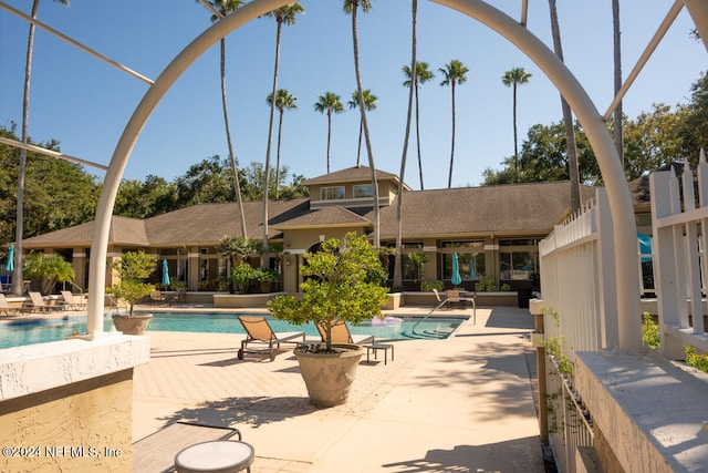 view of swimming pool featuring a patio