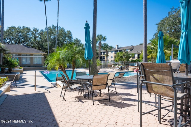 exterior space featuring a community pool