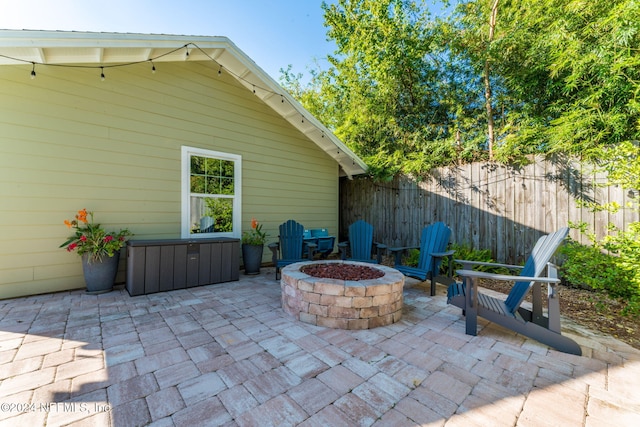 view of patio featuring an outdoor fire pit