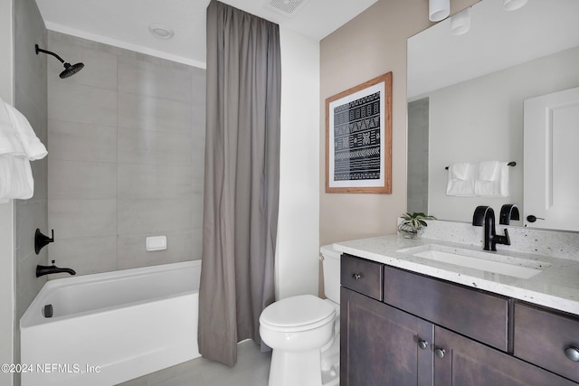 full bathroom featuring vanity, toilet, shower / tub combo, and tile patterned flooring