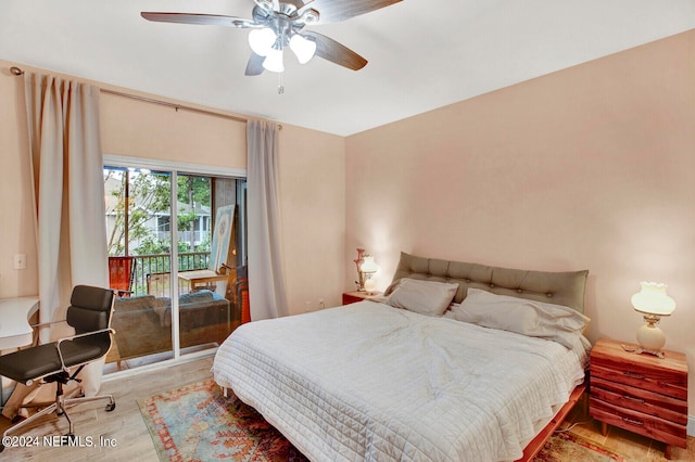 bedroom featuring ceiling fan, wood finished floors, and access to exterior