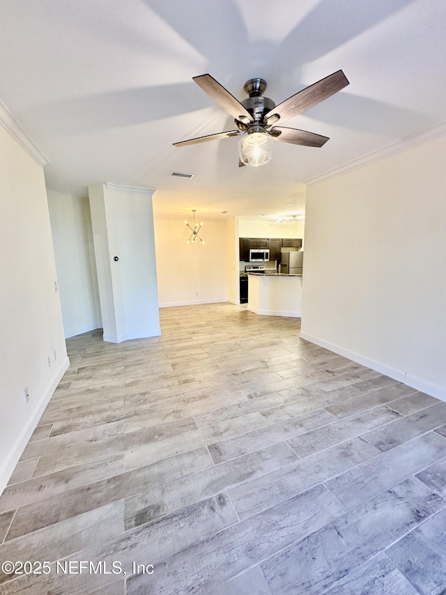 unfurnished living room featuring ceiling fan, visible vents, baseboards, ornamental molding, and light wood-type flooring