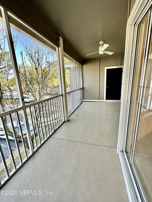 balcony featuring a ceiling fan