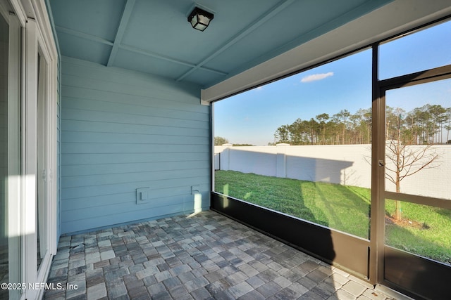 view of unfurnished sunroom