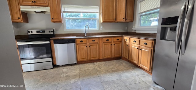 kitchen featuring appliances with stainless steel finishes and sink