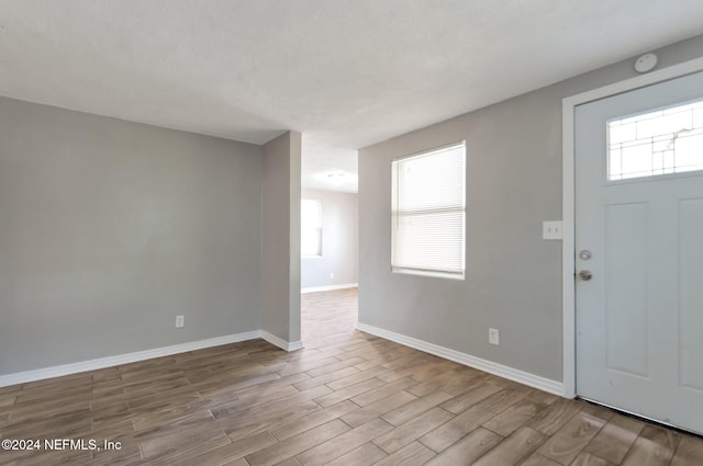 1526 W 14th St, Jacksonville, FL 32209 - foyer entrance with wood finished floors and baseboards