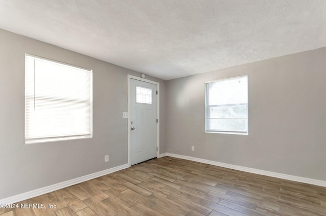 1526 W 14th St, Jacksonville, FL 32209 - foyer featuring baseboards and wood finished floors