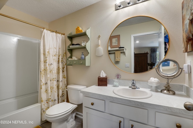 full bathroom featuring vanity, shower / bath combo, a textured ceiling, and toilet