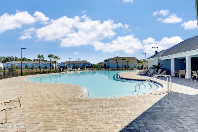 view of pool with a patio