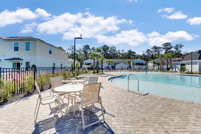 view of pool with a patio area