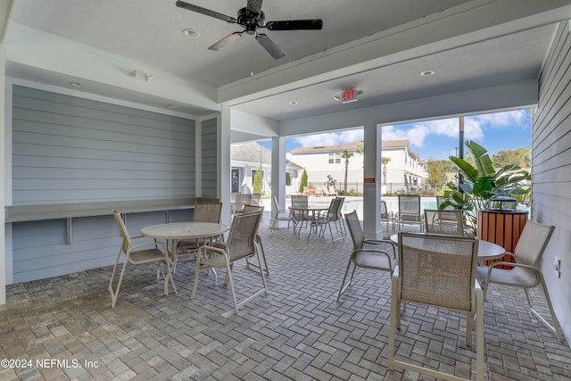 view of patio with ceiling fan