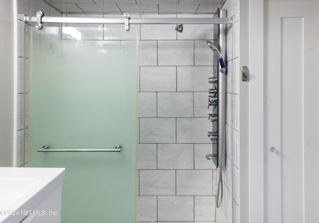 bathroom featuring vanity and walk in shower